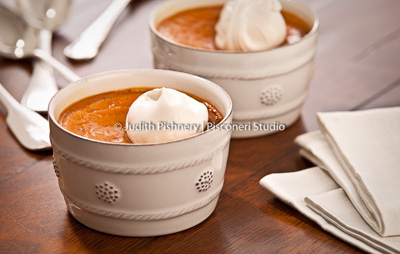 pumpkin custard in ramekins on table